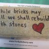 While bricks may fall we shall rebuild with stones